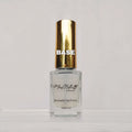 A bottle of Max Natural Breathable Nail Polish with a shiny gold cap and clear glass base, labeled 'BASE' in white text, set against a plain light gray background.