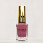 A bottle of Mary Natural 'Breathable' nail polish in shade 77, featuring a metallic gold cap and pink polish inside a clear glass bottle, set against a plain white background.