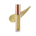 A container of radiant liquid eye shadow with a metallic gold finish, alongside a swatch demonstrating its shimmering texture.
