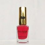 A bottle of Marc Notley Breathable Nail Polish in shade 59, featuring a vibrant pink-red polish inside a clear glass bottle with a shiny gold cap.