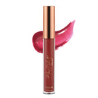 A tube of Dazzel lip gloss in a reddish brown shade with a rose gold cap, alongside a swatch of the product color.